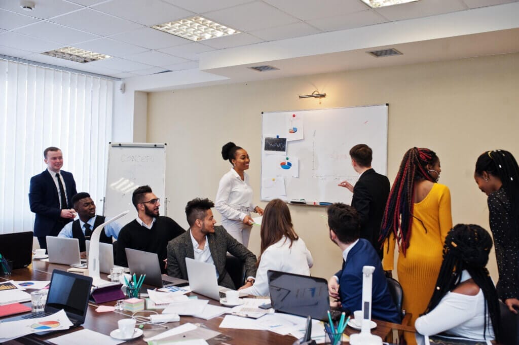Sales Enablement with Custom WordPress Websites: A Beginner's Guide for B2B Sales Managers in 2024 1 Sales team collaborating on custom WordPress website strategy